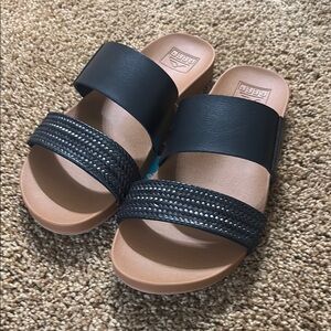 Reef Black and Tan Slide Sandals with Textured Straps